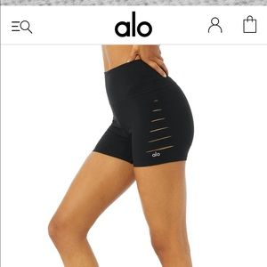 Alo Yoga Ripped Side Shorts in PLUM